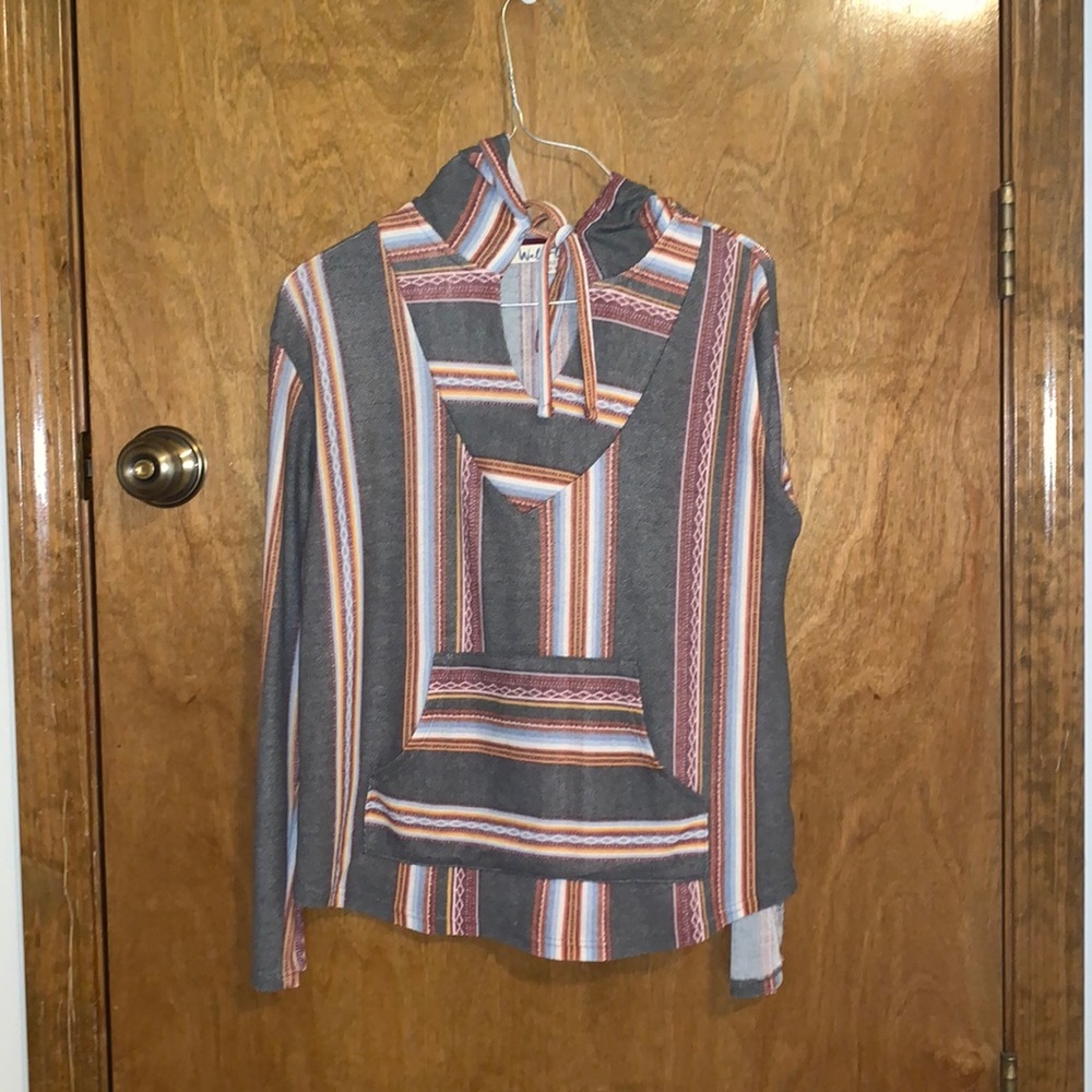 Thin, colorful, hooded drug rug